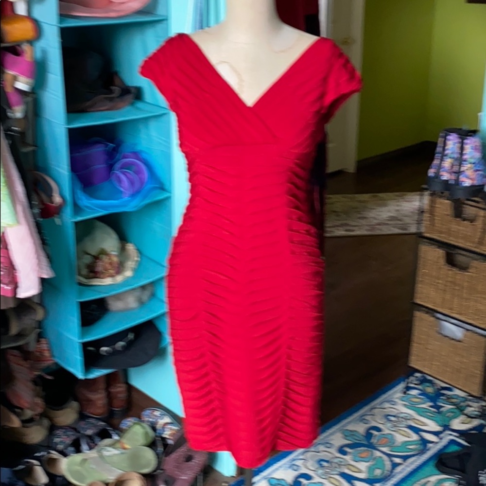 Red figure hugging event dress